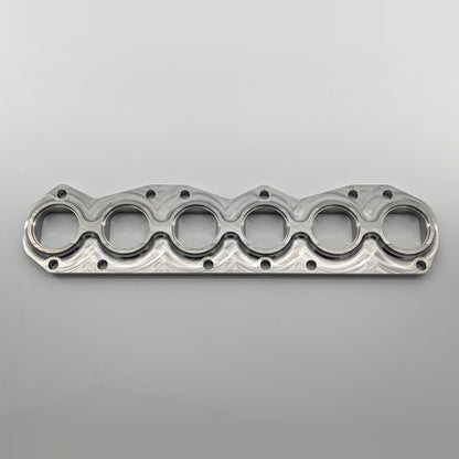 VR6 3.6L 24V exhaust manifold flange small port, tube side top view, CNC machined 304L stainless steel, fits gasket 03H253039E
