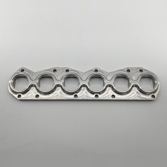 VR6 3.6L 24V exhaust manifold flange small port, tube side top view, CNC machined 304L stainless steel, fits gasket 03H253039E