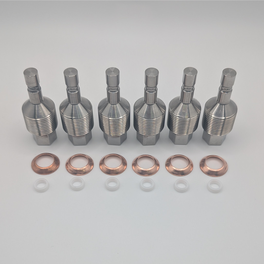 Close up of 3.6L VR6 injector delete block offs, crush washers and o-rings disassembled